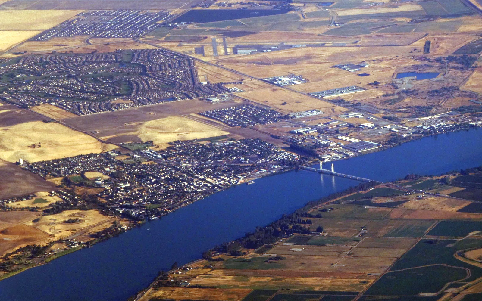 Aerial view of Rio Vista, California, showing the town and Sacramento River with the Rio Vista Bridge visible